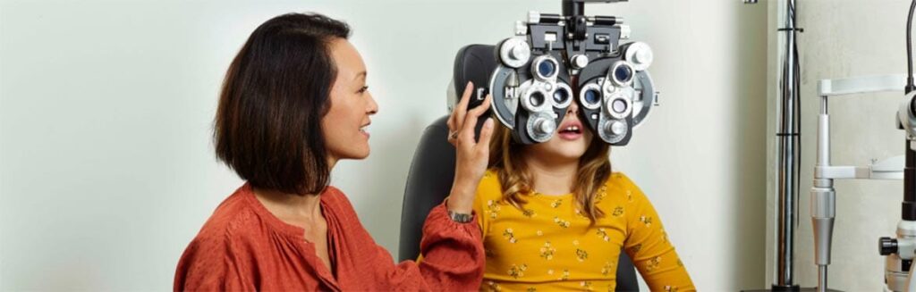 Myopia management, of a child having an eye exam.